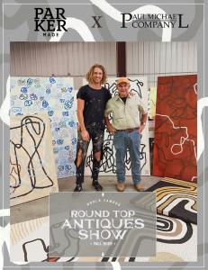 Paul Michael and Parker Heath pose over the completed art comission and their love of abstract art.