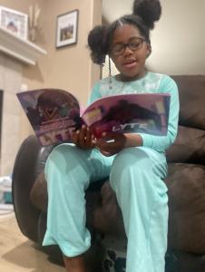 Young girl reading LYTE