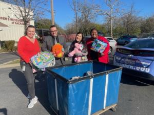 Abraham Cicchetti, Gurnick Academy of Medical Arts’ Sacramento campus director, and other Academy staff host a toy drive for the Children’s Receiving Home of Sacramento on Friday, Dec. 16.