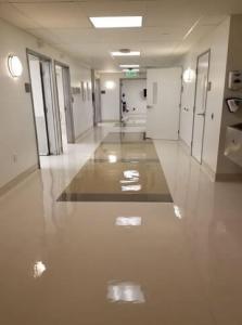 medical office beige VCT strip and wax hallway