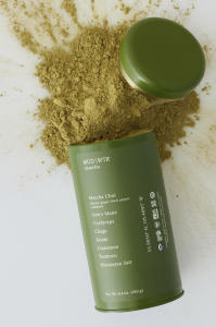 MUDWTR's :rise Matcha blend spilling out of the green tin