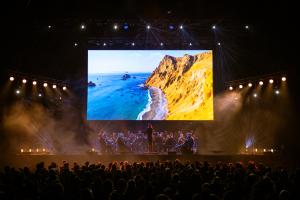 an image showcasing a performance of Our Planet Live in Concert