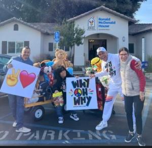 Giving back, from left , Dj Noe-G / Groove Radio, Actress Leilani Shui, Raffles van Exel, and Scarlett Sabin Director of the Bakersfield's Ronald McDonald house deliver gifts to the children at the Ronald McDonald House at the Memorial Hospital campus. Courtesy photo.