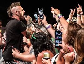 Fans surround Scotty Austin during his show at The Mid Summer Music Festival in Minnesota 