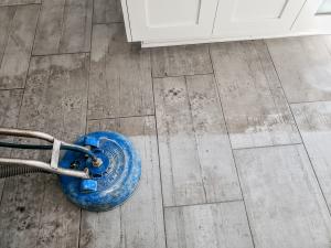 Steam cleaning grey, wood-style tile and grout