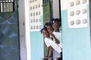 Three students at Lide Haiti. Courtesy Lide Haiti.