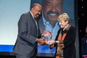 June Simmons hands Robert K. Ross, MD, Partners’ “Lifetime Achievement” award. Pictured from left to right is Robert K. Ross, MD, CEO and President of the California Endowment, and June Simmons, CEO and President of Partners in Care Foundation.