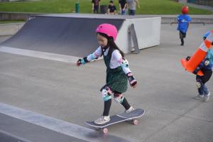 kids are skating in the skatepark