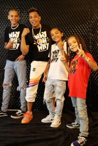 Music Executive Raffles van Exel spearheaded a musical peace movement with top music artists. The Jasper Boyz, Jeramiah (13); Jarius (3); and Malachi (6), are the newest members to lend their vocals to the Artists for Global Unity. Photo: Wardell Jasper